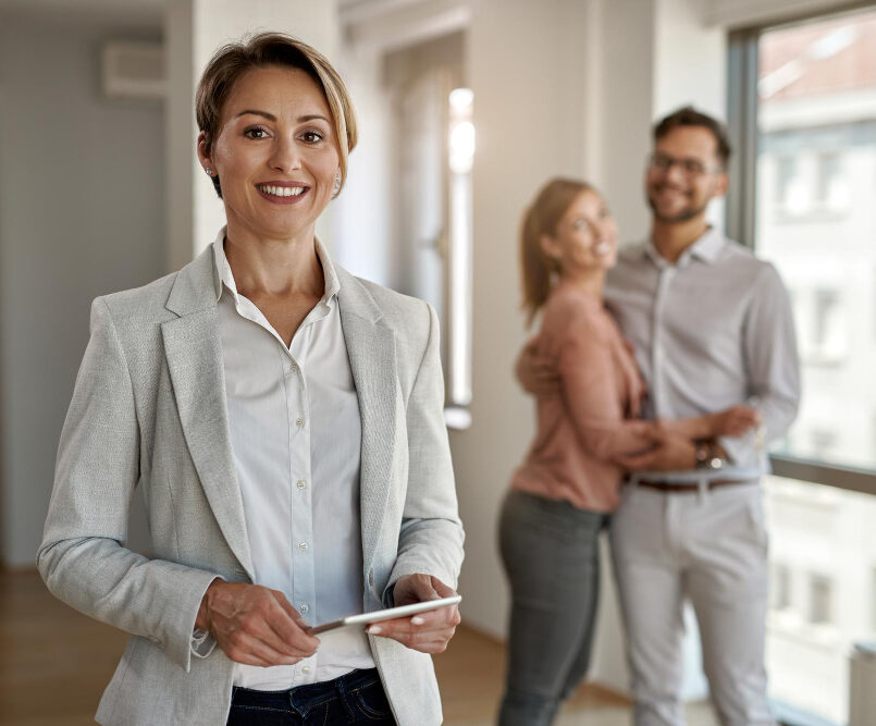 happy couple in their new home